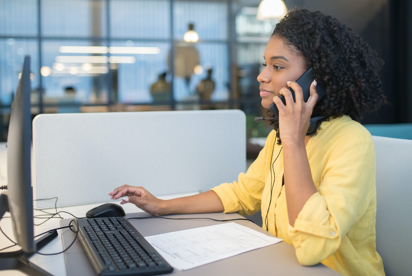 Female call center agent on call