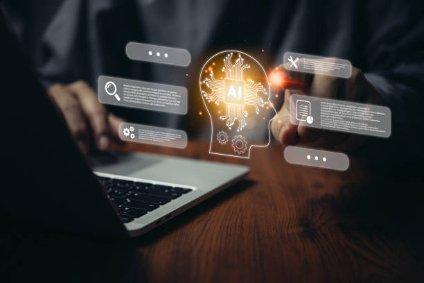 Image showing a person using laptop, with graphic elements displaying AI.
