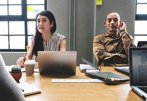 woman-and-man-in-meeting Woman and man in meeting