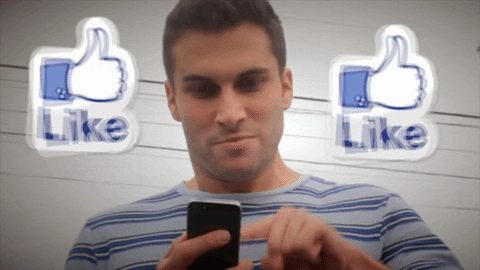 Man pressing like on Facebook gif