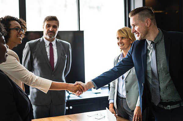 employees-introducing-to-each-other employees introducing to each other