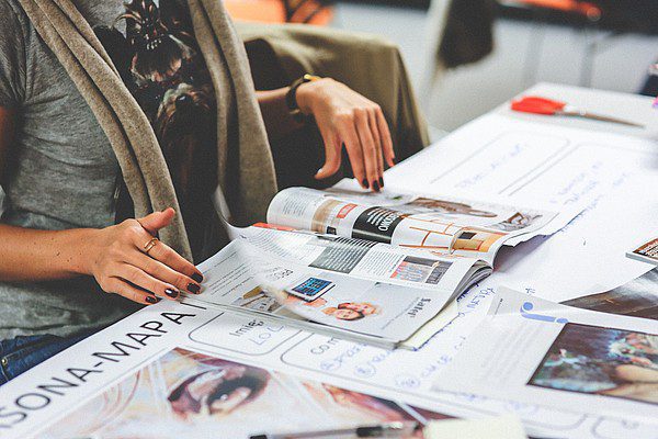 Woman-browsing-magazine Woman browsing magazine